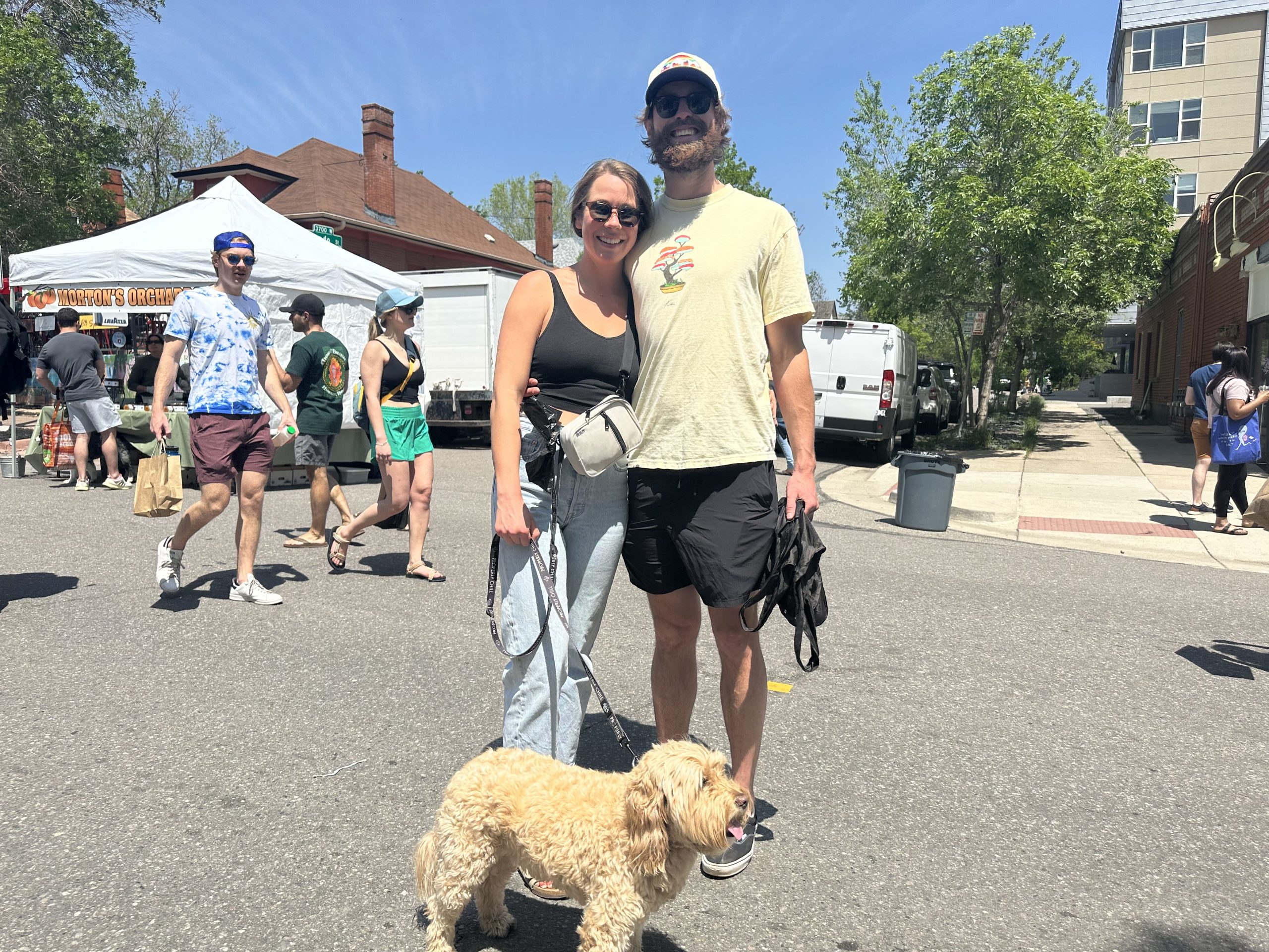 Neighbors shopping at the sunny Highlands Farmers Market